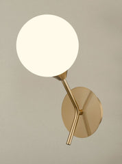 Cosmic 1 light wall bracket in antique gold with matt opal glass