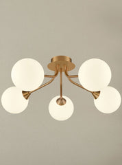 Cosmic 5 light fitting in antique gold with matt opal glass