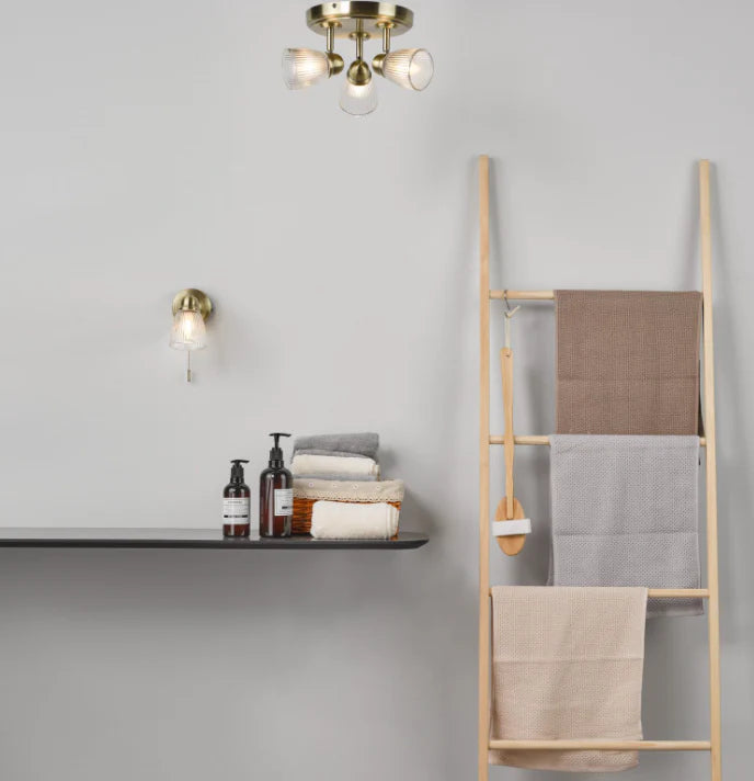 Decorative pendant light over freestanding bathtub