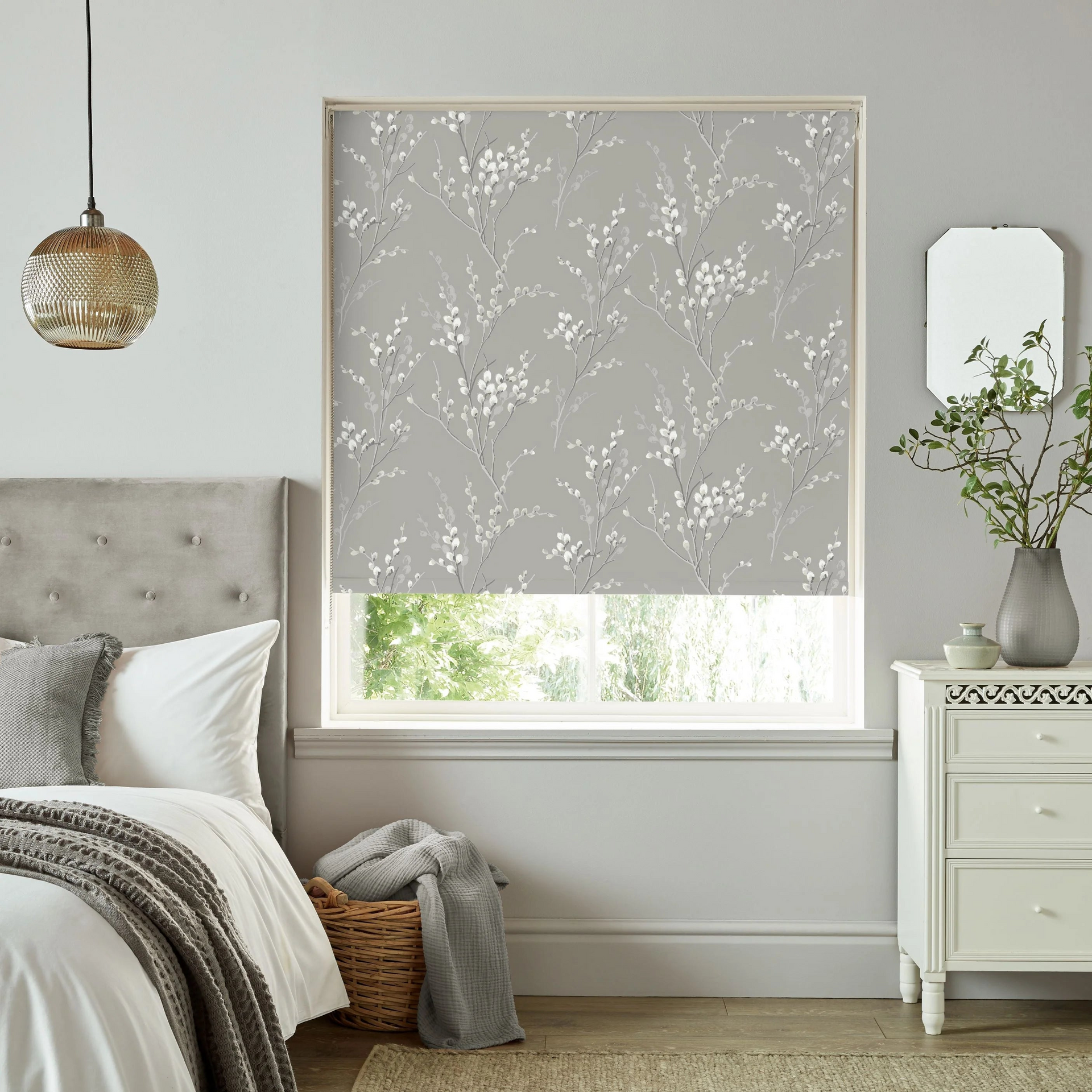 Stylish Laura Ashley roller blinds in kitchen window