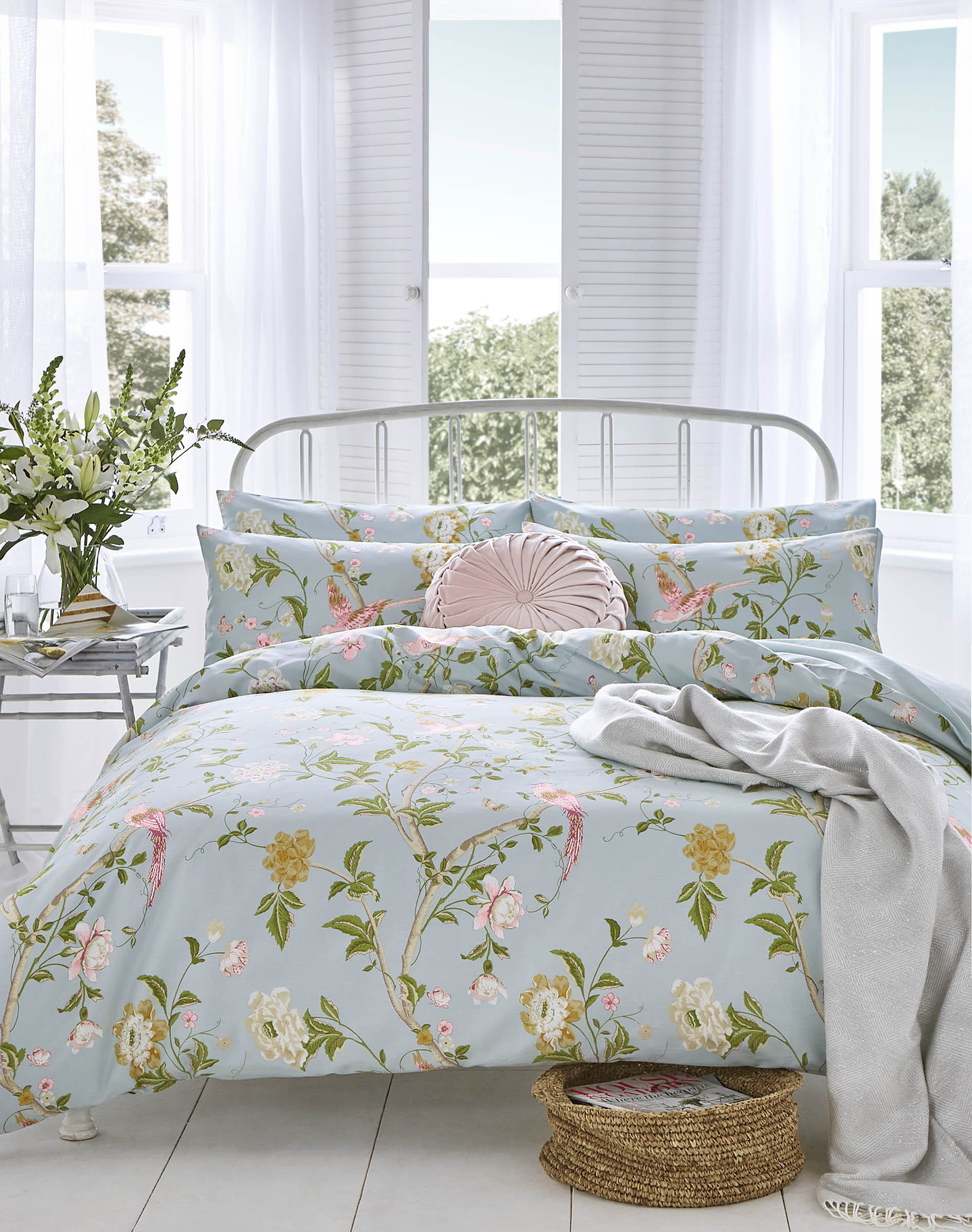 The Laura Ashley summer palace duvet set in duck egg is beautifully floral and spring like with lovely birds and natural elements in the design made in 200TC soft and luxurious.