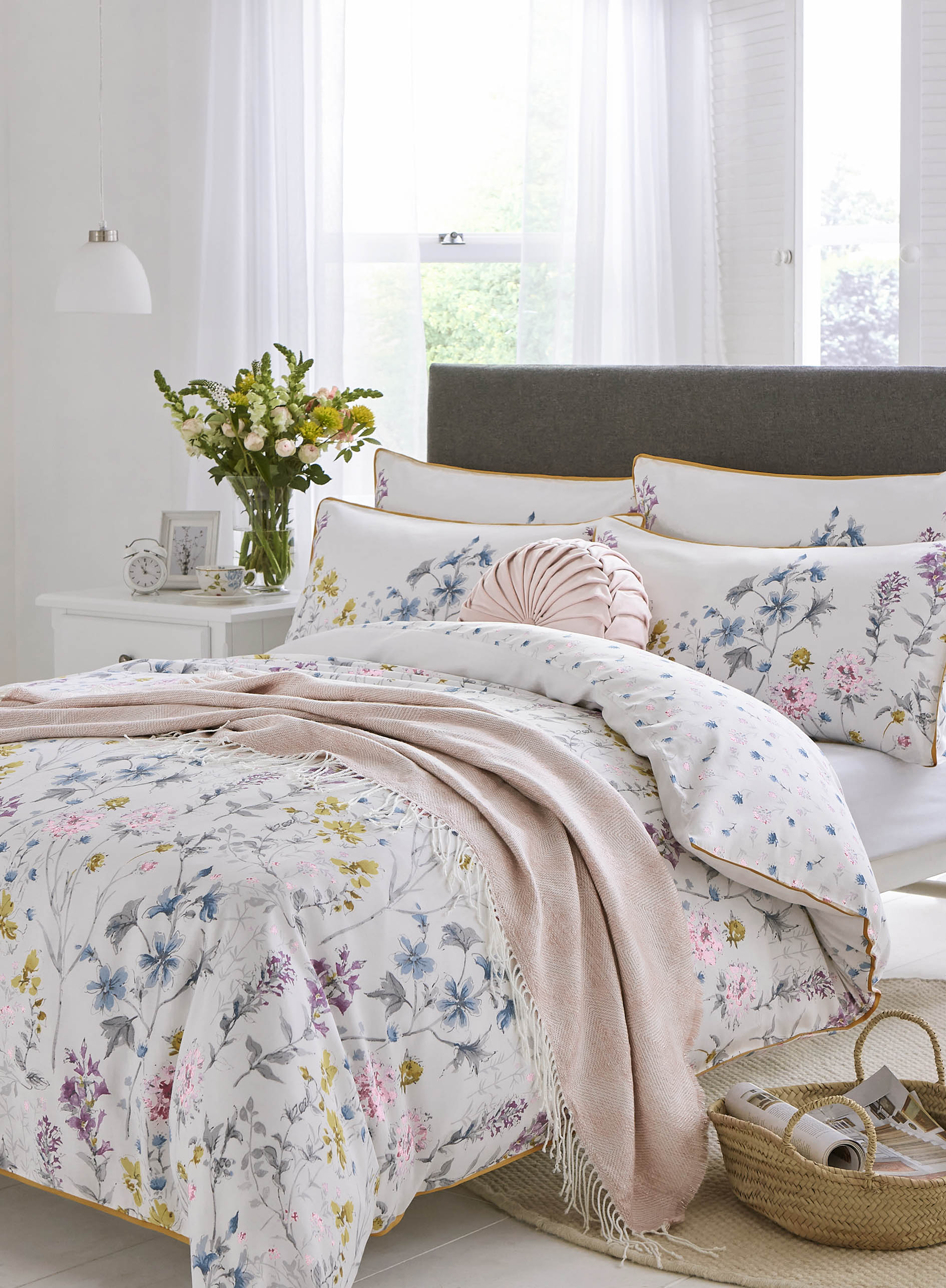 Detailing the Rosanna blush cushion the Wild meadow design beding by Laura Ashley
