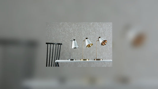Home office desk lit by an adjustable task lamp casting bright, even light across the work surface