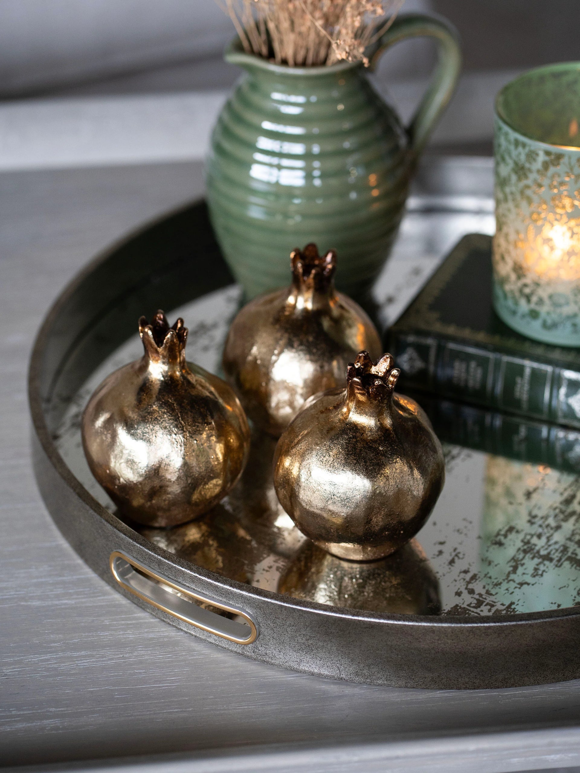 Laura Ashley natural wood deer candleholder on mantelpiece with festive greenery