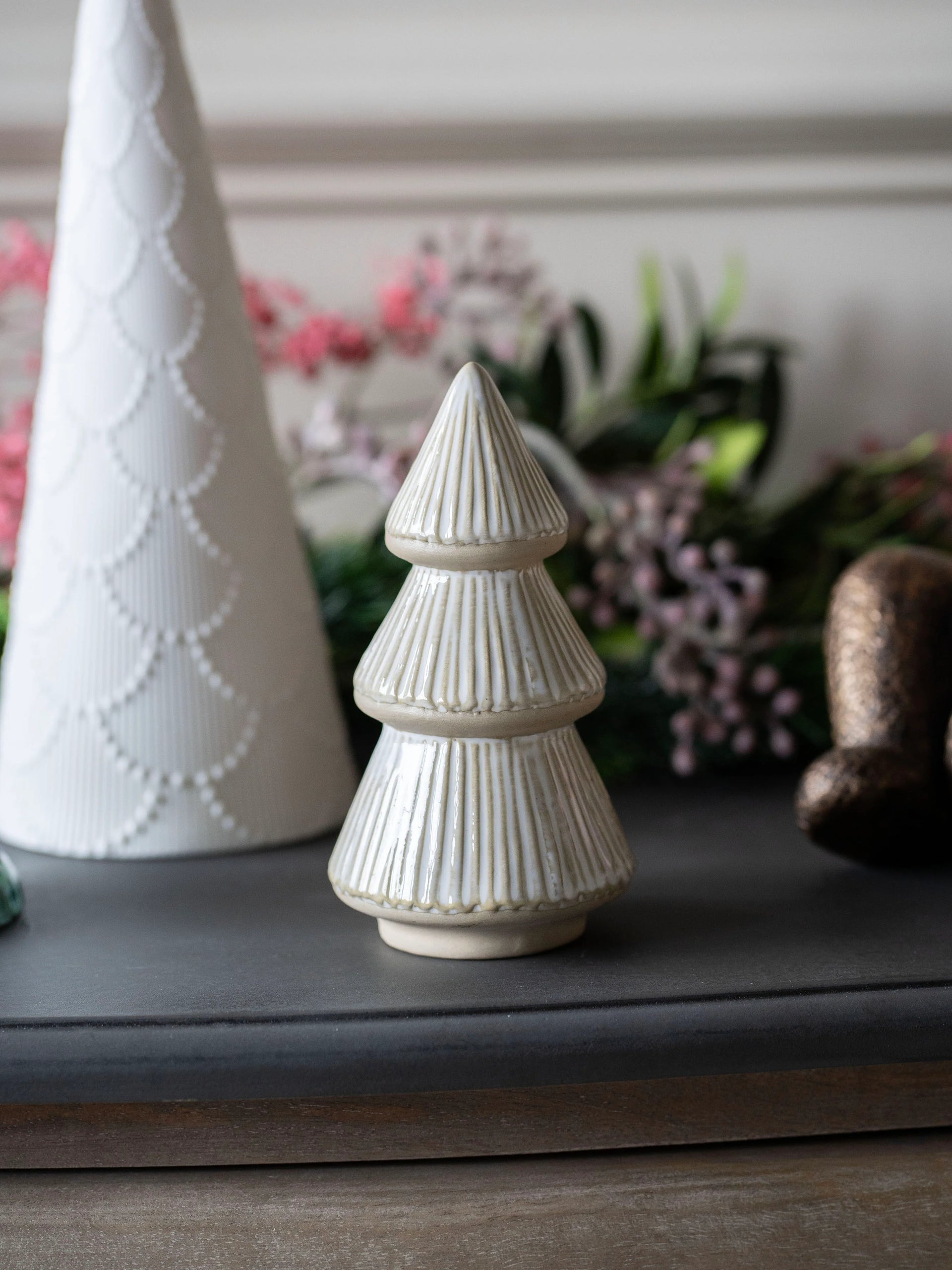 Laura Ashley Cream Ceramic Christmas Tree Decoration hanging on festive tree branch