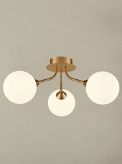 Cosmic 3 light fitting in antique gold with matt opal glass