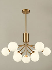 Cosmic 9 light pendant in antique gold with matt opal glass