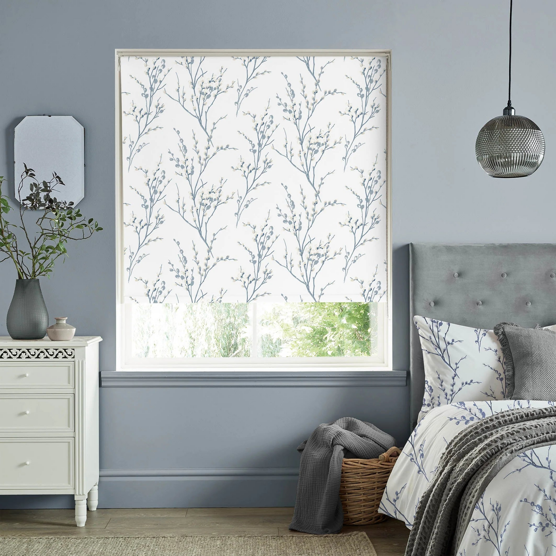 Customizable Laura Ashley roller blinds in bedroom setting