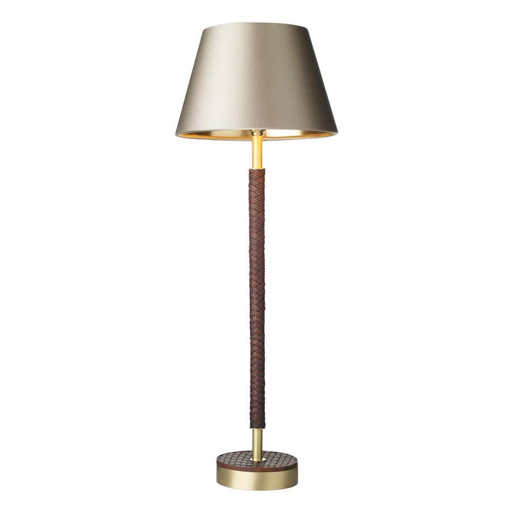 The Hunter table lamp by David Hunt Lighting is a modern fitting with a simple stylish design and a leather effect and butter brass metalwork giving it a warm ambient light shown with a tapered dum shade  in a 20cm diameter