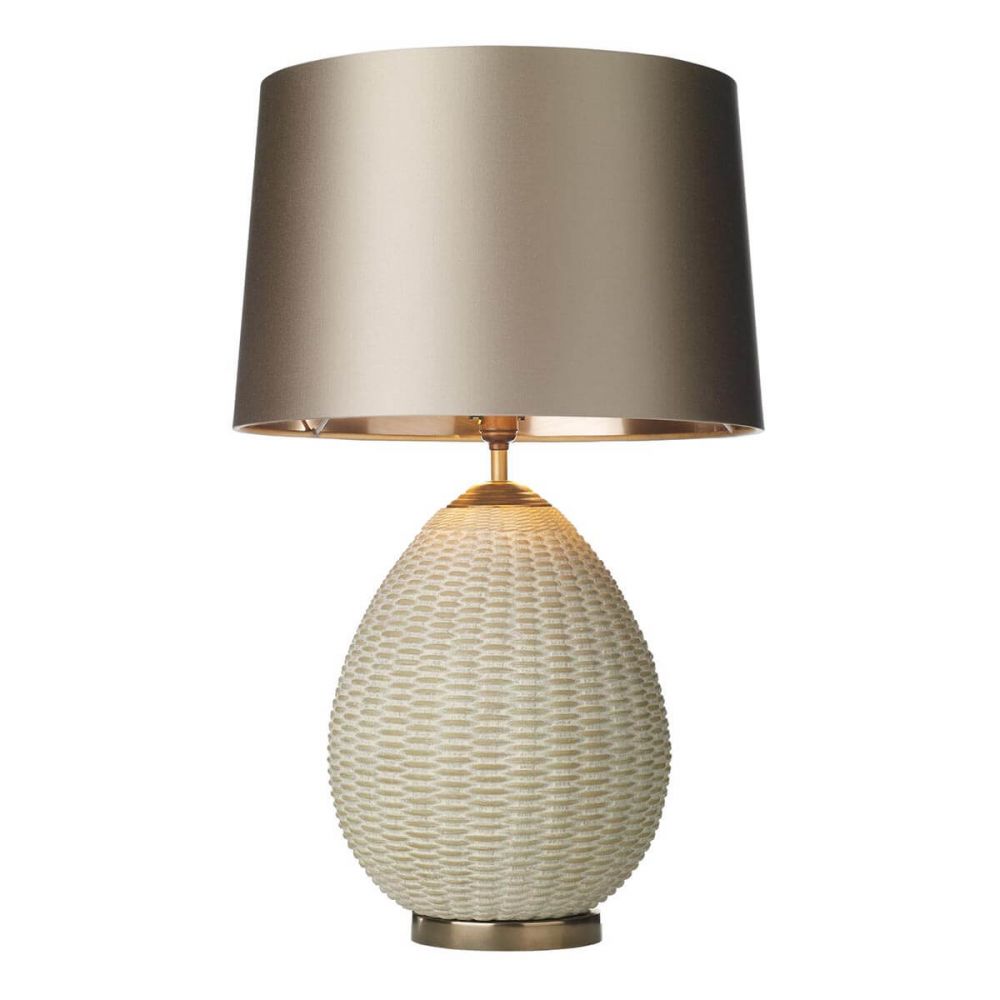 Shaped like an egg this lamp will add lots of texture it is finished in a rattan effect with material sewn together in a weave formation, the base of the lamp is a soft bronze finish.