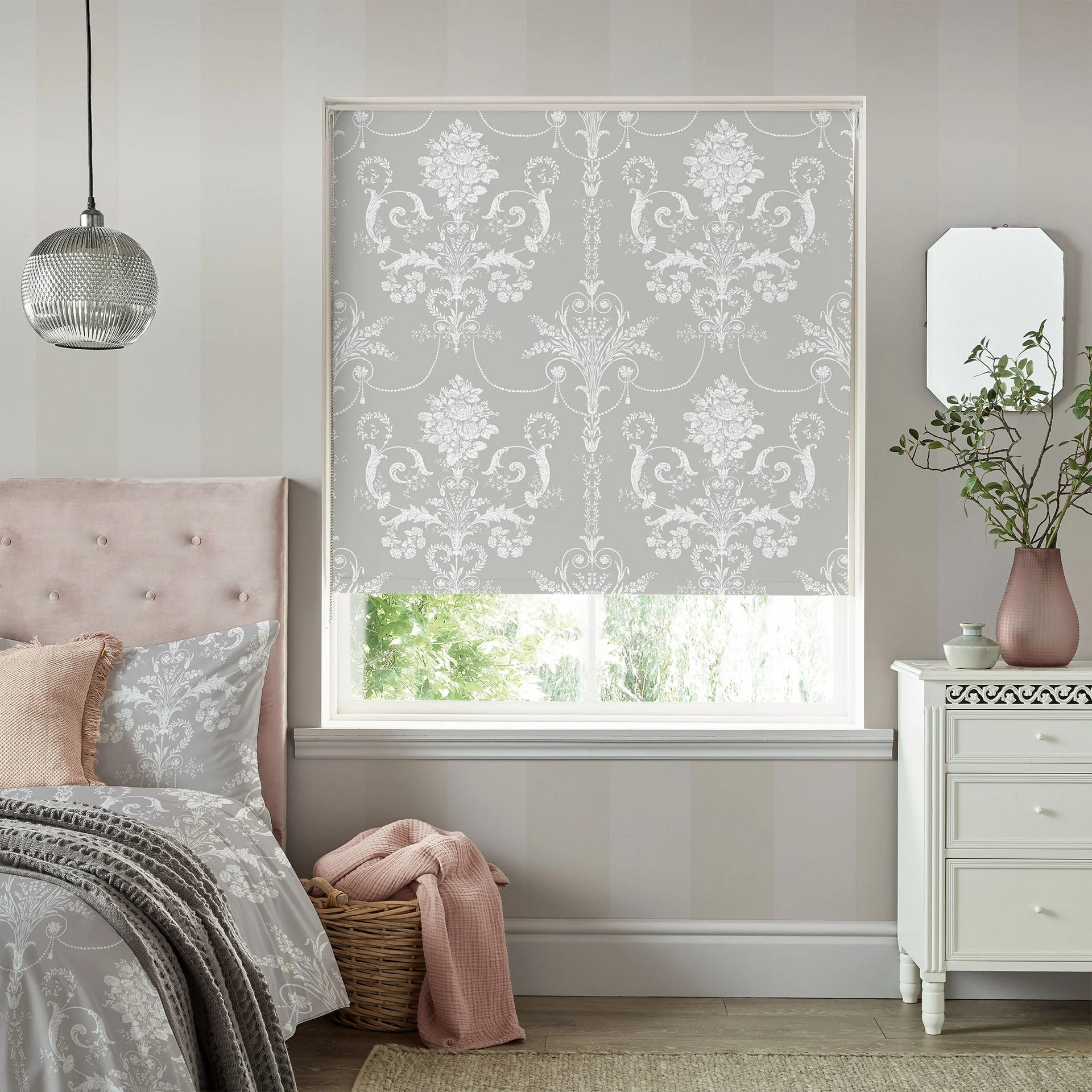 Laura Ashley ready made roller blinds in a modern living room