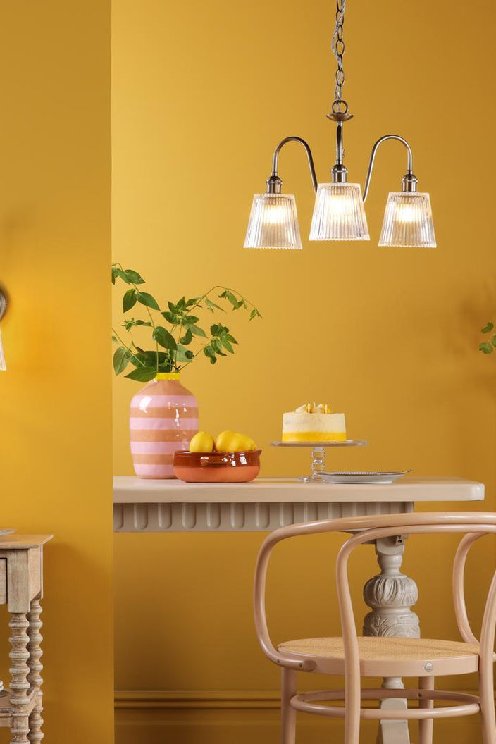 Double insulated Hadano antique chrome and ribbed glass pendant lighting a yellow kitchen diner